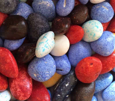 Colorful chocolate rocks milk chocolate with candy shell