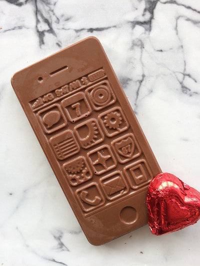 Chocolate Cellphone with heart and text me greeting