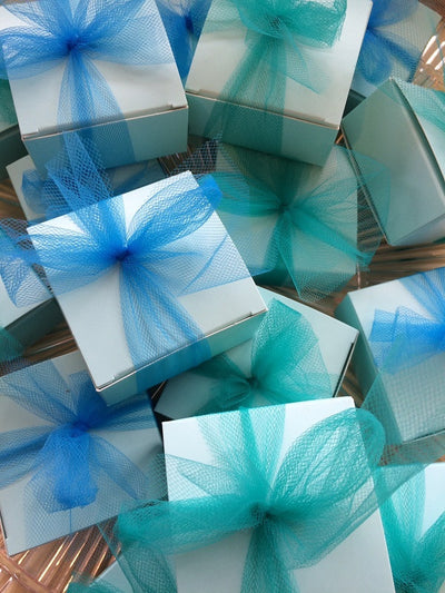 Truffles with blue box, blue ribbon