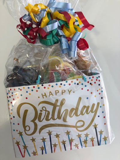 Happy Birthday Basket with chocolates, fudge, candy fruit slices, pretzels and peanut butter cup