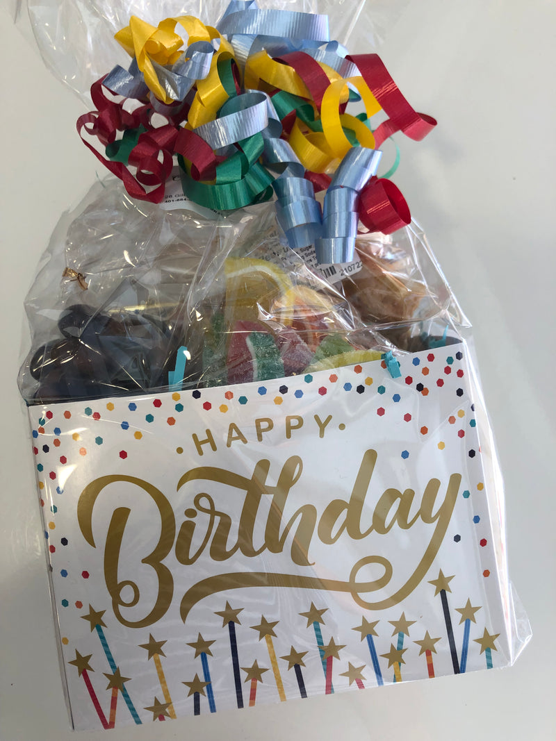 Happy Birthday Basket with chocolates, fudge, candy fruit slices, pretzels and peanut butter cup